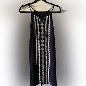 Sleeveless dress, blue with white embroidery design. 35 1/2” length.